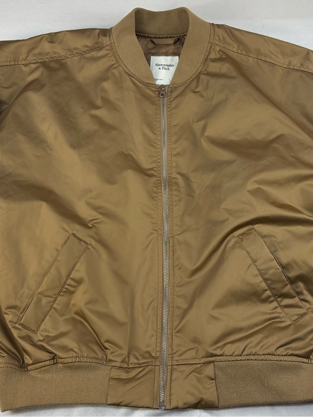 Abercrombie & Fitch Woman’s shiny tan/gold wind and water resistant puffer coat